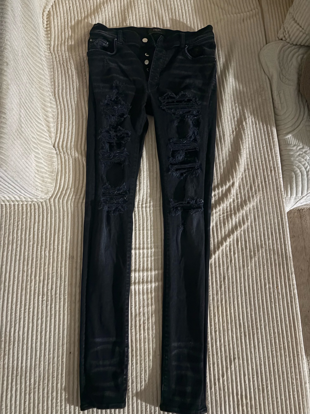 AMIRI Black Denim Jacket with Silver Snap Buttons can be worn by women sizes s